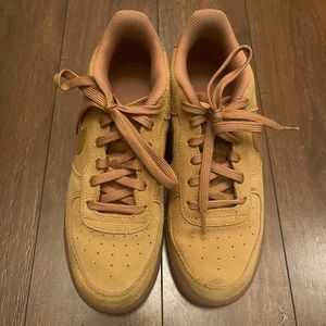 Brown suede Nike sneakers